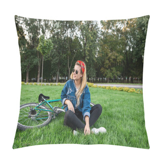 Personality  Stylish Attractive Young Woman Sits On A Lawn In A Park On A Lawn And Smiles. Beautiful Girl In A Stylish Outfit Resting On The Grass While Walking On A Bike.Relax Outdoors Pillow Covers