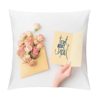 Personality  Hand Holding Paper With TRUST YOUR SOUL Sign Beside Pink Flowers In Envelope Isolated On White Pillow Covers