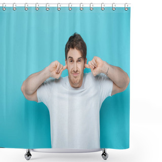 Personality  Displeased Young Man Plugging Ears With Fingers While Looking At Camera On Blue Background Shower Curtains