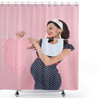Personality  Smiling Pregnant Woman In Polka Dot Dress Hanging Out Baby Clothes On Clothesline Isolated On Pink Shower Curtains