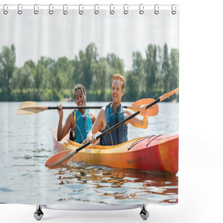 Personality  Young Redhead Man In Life Vest Paddling In Kayak On Summer Day Near Cheerful And Pretty African American Woman On River With Green Bank On Blurred Background Shower Curtains