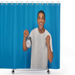 Personality  Excited African American Man With Open Mouth Holding Alarm Clock On Blue Background, Face Expression Shower Curtains