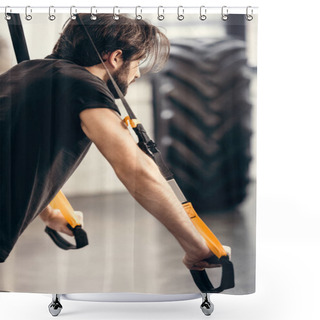 Personality  Side View Of Athletic Young Man Training With Fitness Straps In Gym Shower Curtains