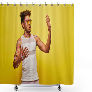 Personality  Surprised African American Man Looking At Stickers On His Hands And Body On Yellow Background Shower Curtains