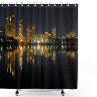 Personality  Dark Cityscape With Illuminated Buildings With Reflection On Water At Night Shower Curtains