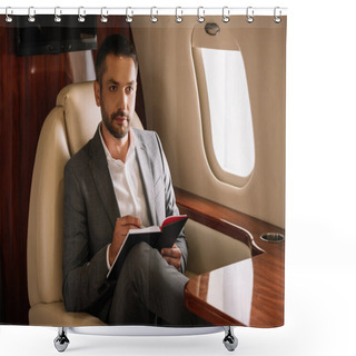 Personality  Selective Focus Of Bearded Businessman Holding Notebook And Pen In Private Jet  Shower Curtains