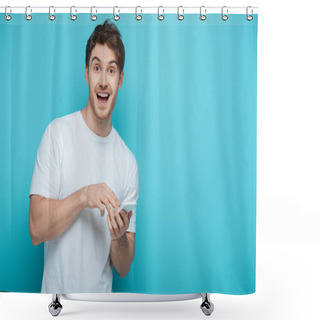Personality  Excited Guy Looking At Camera While Chatting On Smartphone On Blue Background Shower Curtains