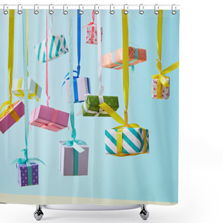 Personality  Festive Colorful Gift Boxes Hanging On Ribbons On Blue Background Shower Curtains
