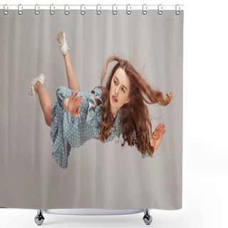 Personality  Beautiful Girl Levitating In Mid-air, Falling Down And Her Hair Messed Up Soaring From Wind, Model Flying Hovering With Dreamy Peaceful Expression. Indoor Studio Shot Isolated On Gray Background Shower Curtains