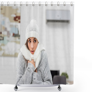 Personality  Close-up Portrait Of Freezing Young Woman In Warm Clothes With Air Conditioner On Background Shower Curtains