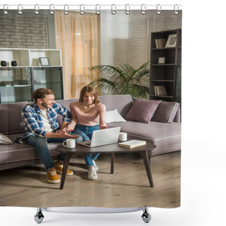 Personality  Front View Of Smiling Couple On Couch Using Laptop In Cozy Living Room Shower Curtains