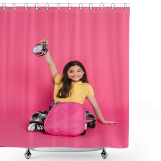 Personality  Positive And Brunette Schoolgirl Sitting With Backpack, Holding Vintage Alarm Clock On Pink Shower Curtains