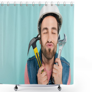 Personality  Young Man In Hardhat Pouting Lips And Holding Tools Isolated On Blue  Shower Curtains