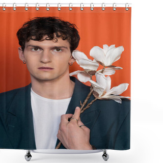 Personality  Portrait Of Stylish Curly Man Holding Magnolia Branch Isolated On Orange Shower Curtains