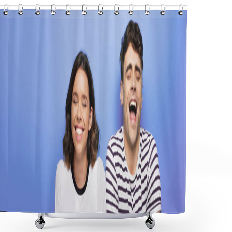 Personality  panoramic shot of cheerful man and woman laughing with closed eyes on blue background shower curtains
