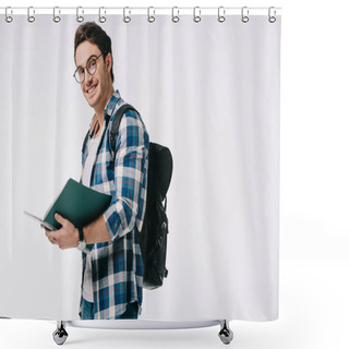 Personality  Smiling Handsome Student Holding Copybook And Looking At Camera Isolated On White Shower Curtains