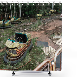 Personality  PRIPYAT, UKRAINE - AUGUST 15, 2019: Selective Focus Of Abandoned And Damaged Bumper Cars In Amusement Park  Shower Curtains
