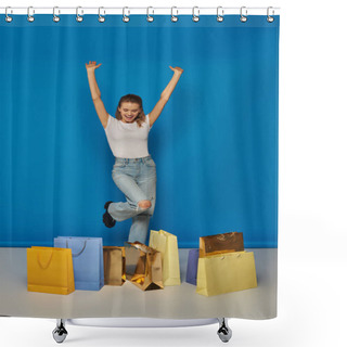 Personality  Woman Feeling Joy From Shopping, Standing With Raised Hands Near Shopping Bags On Blue Background Shower Curtains