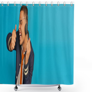 Personality  Thrilled African American Student In Wireless Headphones Showing Thumbs Up On Blue, Banner Shower Curtains