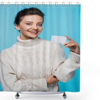 Personality  Positive Woman In White Sweater Holding Blank Card With Copy Space Isolated On Blue Shower Curtains