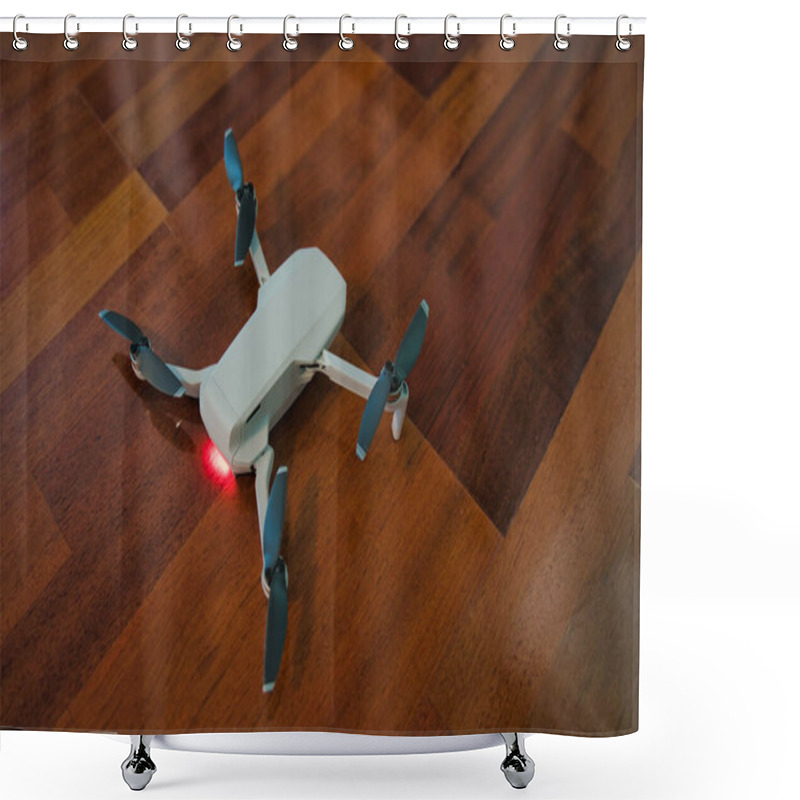 Personality  Drone Sitting On Wooden Floor With Light On Indicating Dead Battery. Indoor Drone Flying. Shower Curtains
