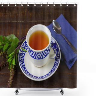 Personality  Tulsi Or Holy Basil Tea In White Cup With Fresh Tulsi Leaf On Wooden Background. Ayurvedic Medicine In India. Shower Curtains