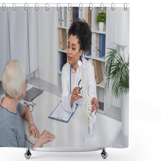 Personality  African American Doctor Looking At Senior Woman Near Spine Model In Clinic  Shower Curtains