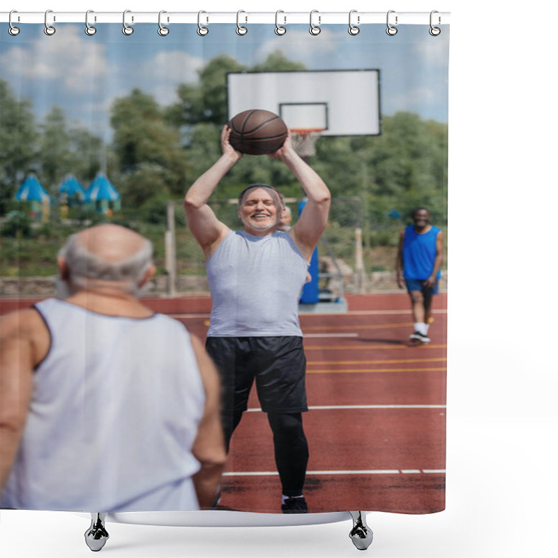 Personality  selective focus of old multiethnic friends playing basketball on summer day shower curtains