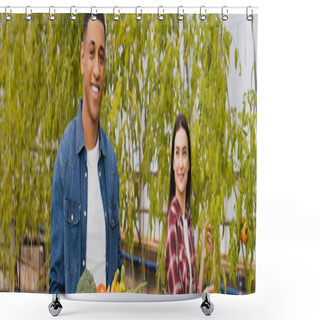 Personality  Smiling African American Farmer Looking At Camera Near Vegetables And Colleague In Greenhouse, Banner  Shower Curtains