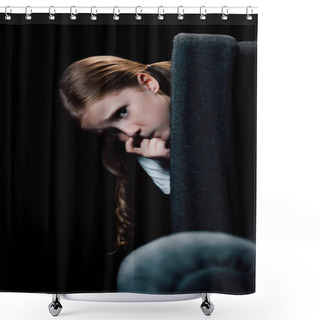 Personality  Frightened Child Looking At Camera While Hiding Behind Armchair Isolated On Black Shower Curtains