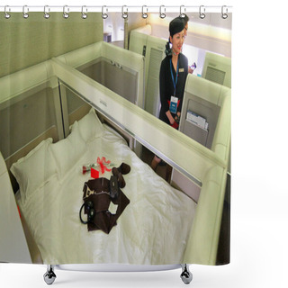 Personality  A Flight Attendant Stands Next To A First-class Cabin Of A Boeing 777-300ER Jet Plane Of China Eastern Airlines At An Airport In Shanghai, China, 26 September 2014 Shower Curtains