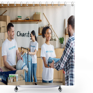 Personality  Selective Focus Of Pretty African American Girl Giving Clothes To Man While Multicultural Volunteers Unpacking Clothes Shower Curtains