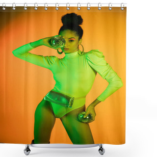 Personality  Fashionable African American Woman In Neon Bodysuit Holding Disco Balls On Orange Background  Shower Curtains