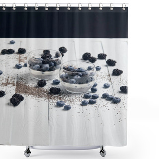 Personality  Selective Focus Of Glasses With Yogurt And Berries Near Scattered Chia Seeds Isolated On Black Shower Curtains