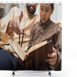 Personality  Muslim Man With Prayer Beads Pointing At Book Near Son At Home  Shower Curtains