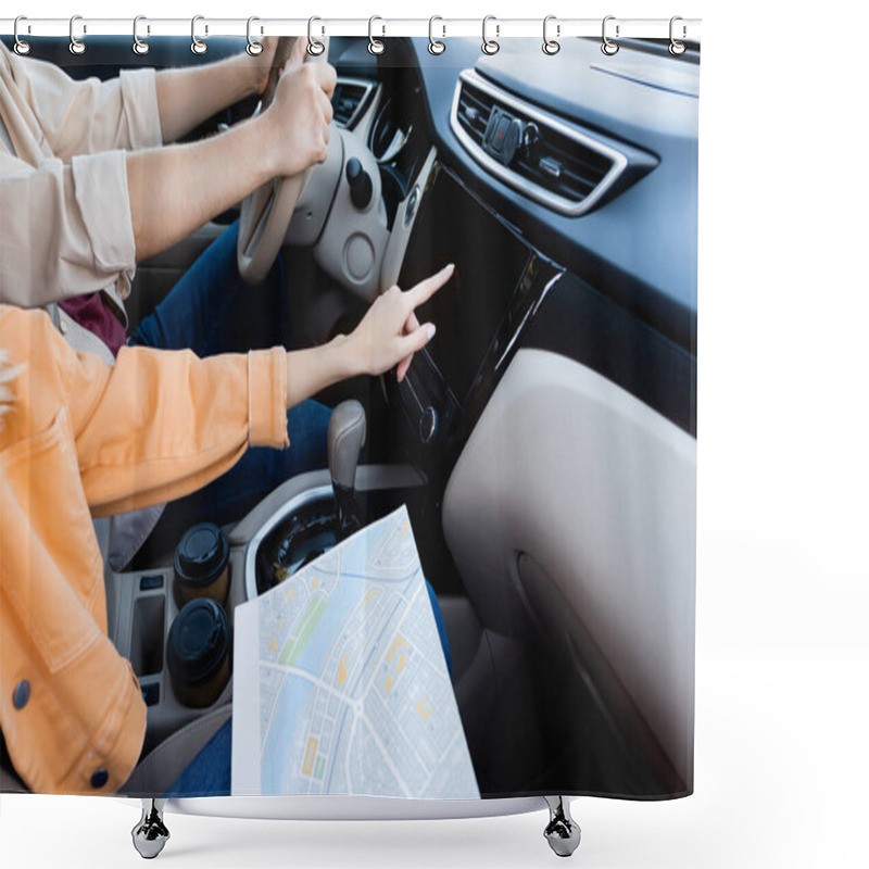 Personality  Cropped view of woman with map using audio system while husband driving car  shower curtains