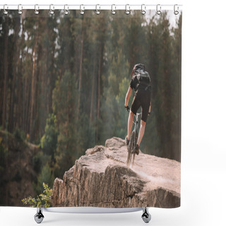 Personality  Back View Of Young Trial Biker Riding On Rocks Outdoors Shower Curtains