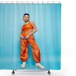 Personality  Beautiful Fashion Model In Bright Colourful Outfit Looking At Camera And Posing On Blue Backdrop Shower Curtains