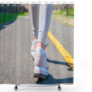 Personality  Walking. Close-up Of Women's Running Shoes On A Paved Trail. Female Feet In Sneakers. Shower Curtains