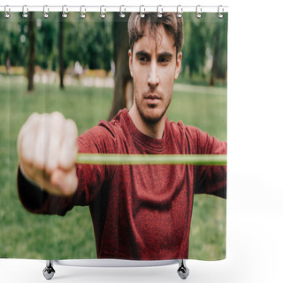 Personality  Selective Focus Of Handsome Man Exercising With Resistance Band In Park  Shower Curtains