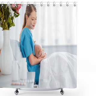 Personality  Side View Of Happy Young Mother Sitting On Bed And Breastfeeding Newborn Baby In Hospital Room Shower Curtains