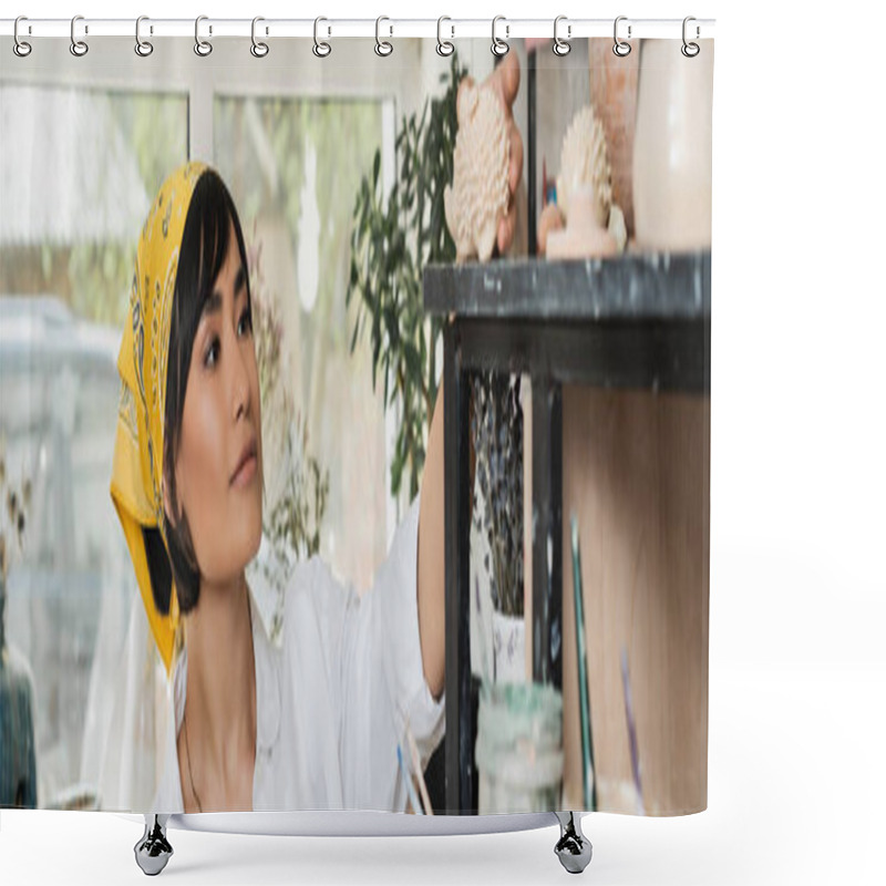 Personality  Young Brunette Female Asian Artist In Headscarf Taking Clay Product While Standing Near Shelf With Pottery Tools In Blurred Pottery Class At Background, Pottery Studio With Artisan At Work, Banner  Shower Curtains