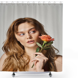 Personality  Beauty Shot Of Pretty Curious Woman With Blue Eyes, Holding Peachy Rose Near Face On Grey Background Shower Curtains