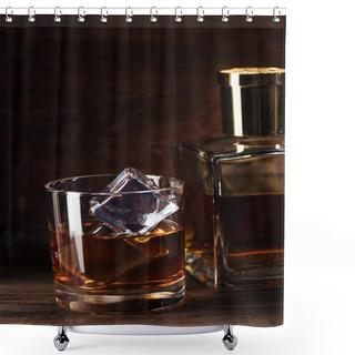Personality  Close-up View Of Glass Of Cognac With Ice Cubes And Bottle On Wooden Table    Shower Curtains