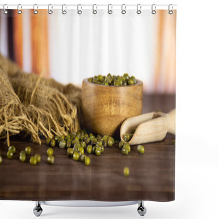 Personality  Composition Of Lot Of Whole Dry Green Mung Beans With Wooden Bowl With Silk Curtains Behind Shower Curtains