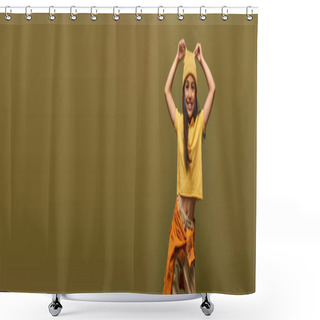 Personality  Smiling And Trendy Preteen Kid With Colored Hair In Urban Outfit Looking At Camera While Touching Yellow Hat And Standing Isolated On Khaki, Stylish Girl In Modern Outfit Concept, Banner  Shower Curtains