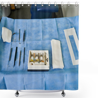 Personality  A Table Is Set Up With Surgical Equipment On Top Of A Blue Table Cloth. Shower Curtains