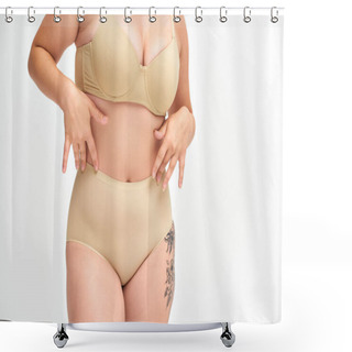 Personality  Cropped View Of Young Plus Size Woman In Beige Lingerie With Tattooed Hip On White Backdrop Shower Curtains