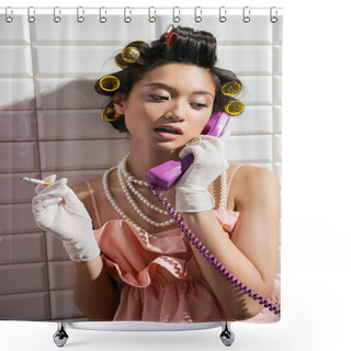 Personality  Brunette And Asian Young Woman With Hair Curlers Standing In Pink Ruffled Top, Pearl Necklace And White Gloves Smoking And Talking On Retro Phone Near White Tiles, Housewife, Holding Cigarette  Shower Curtains