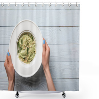 Personality  Cropped View Of Woman Holding Plate With Green Ravioli With Pine Nuts And Sage At Wooden Table Shower Curtains